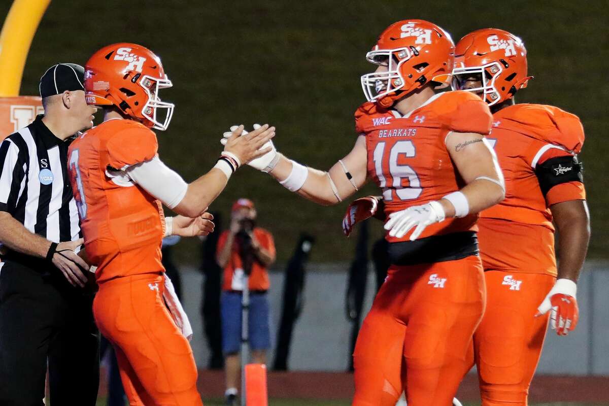 Sam Houston's Eric Schmid, left, has thrown for 2,464 yards and 27 touchdowns and is Sam Houston’s third-leading rusher with 338. 