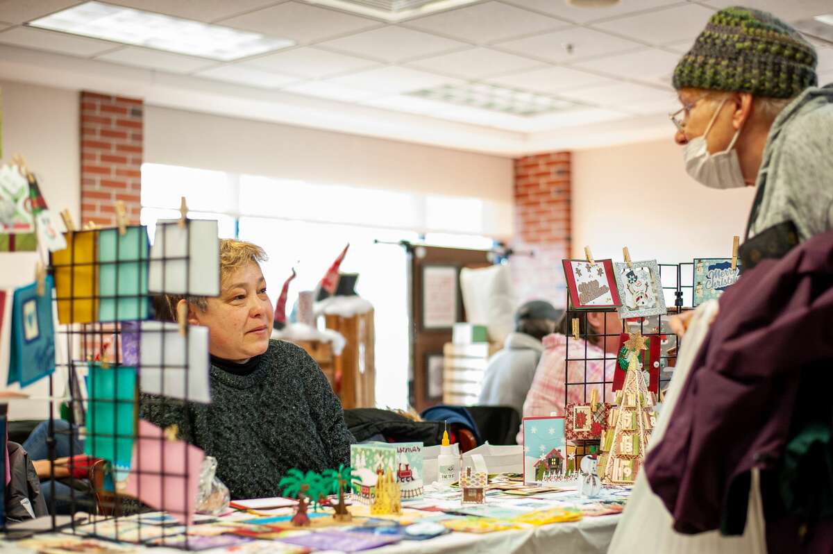 Vendors and customers gather at the Holiday Craft Bazaar on Dec. 4, 2021 at the Greater Midland Community Center.