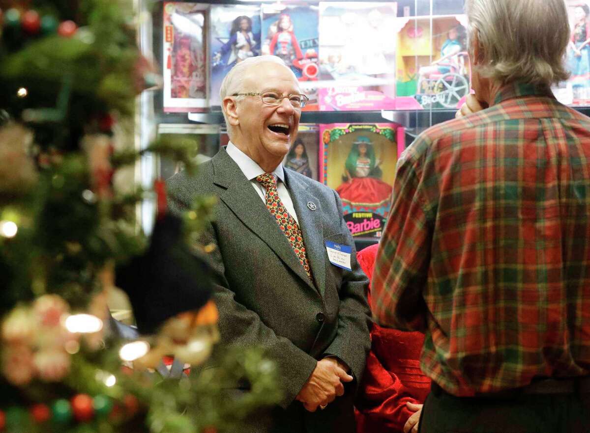 George Williamson laughs during the Heritage Museum of Montgomery County’s Christmas open house, Saturday, Dec. 4, 2021, in Conroe.