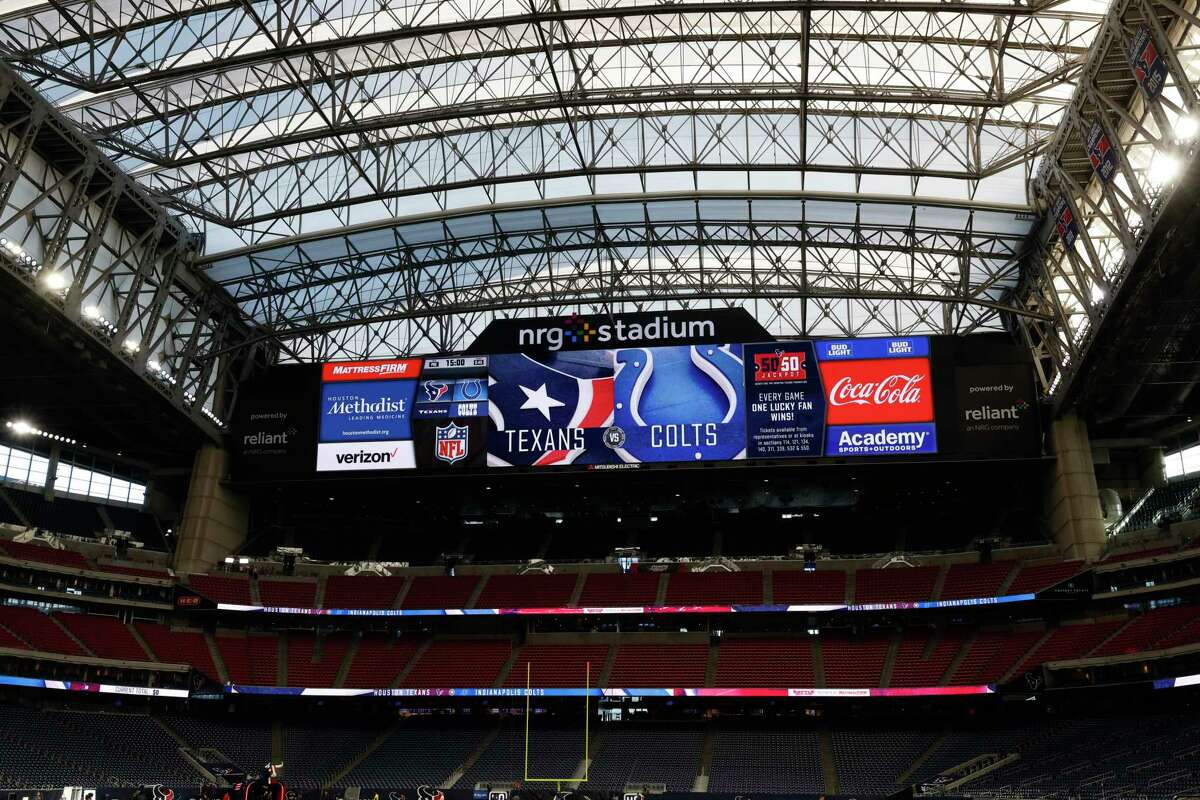 The videoboard or scoreboard at NRG Stadium shows the matchup for an NFL football game between the Indianapolis Colts and the Houston Texans, Sunday, Dec. 5, 2021, in Houston. (AP Photo/Matt Patterson)