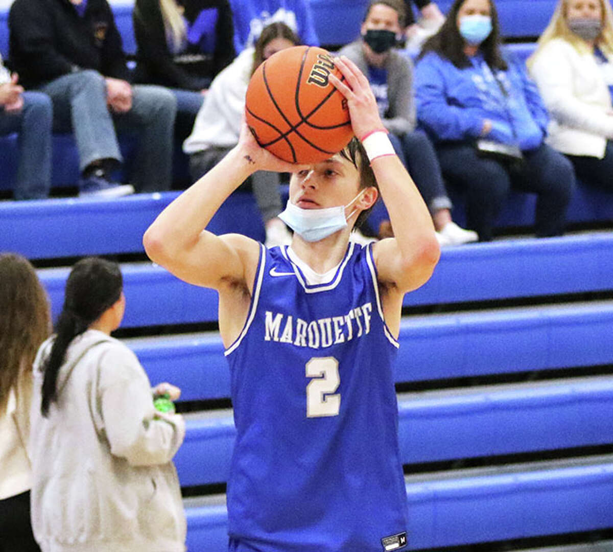 Marquette's Braden Kline takes a shot during a game at the Hoopsgiving Classic earlier this season at Roxana. The Explorers were home Saturday night and fell to Breese Mater Dei.