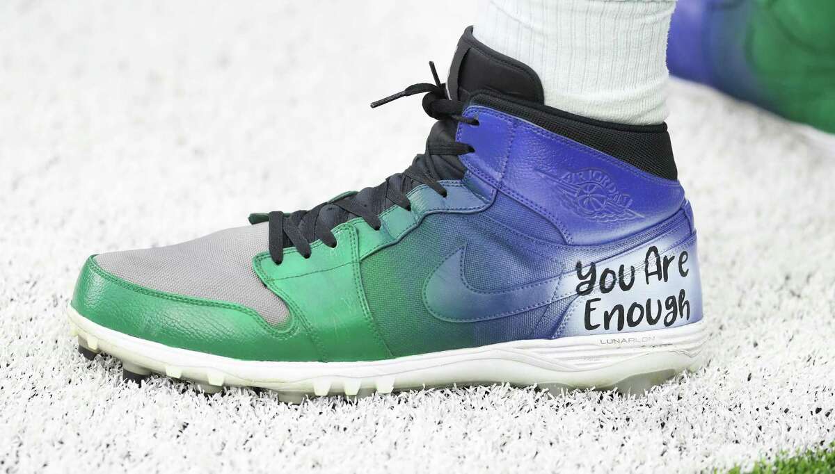 Indianapolis Colts tight end Mo Alie-Cox’s cleats before an NFL football game at NRG Stadium, Sunday, Dec. 5, 2021 in Houston.
