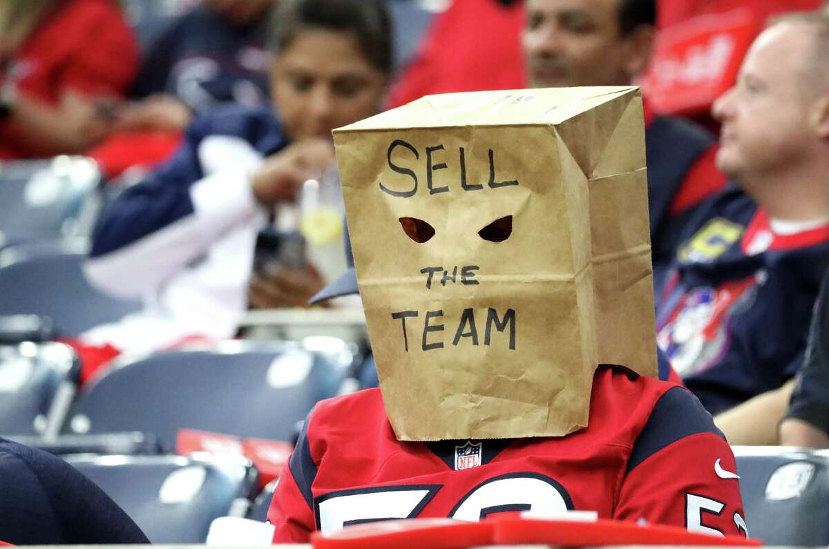 A Houston Texans fan with a bag on his head just before halftime of an NFL football game at NRG Stadium, Sunday, Dec. 5, 2021 in Houston.