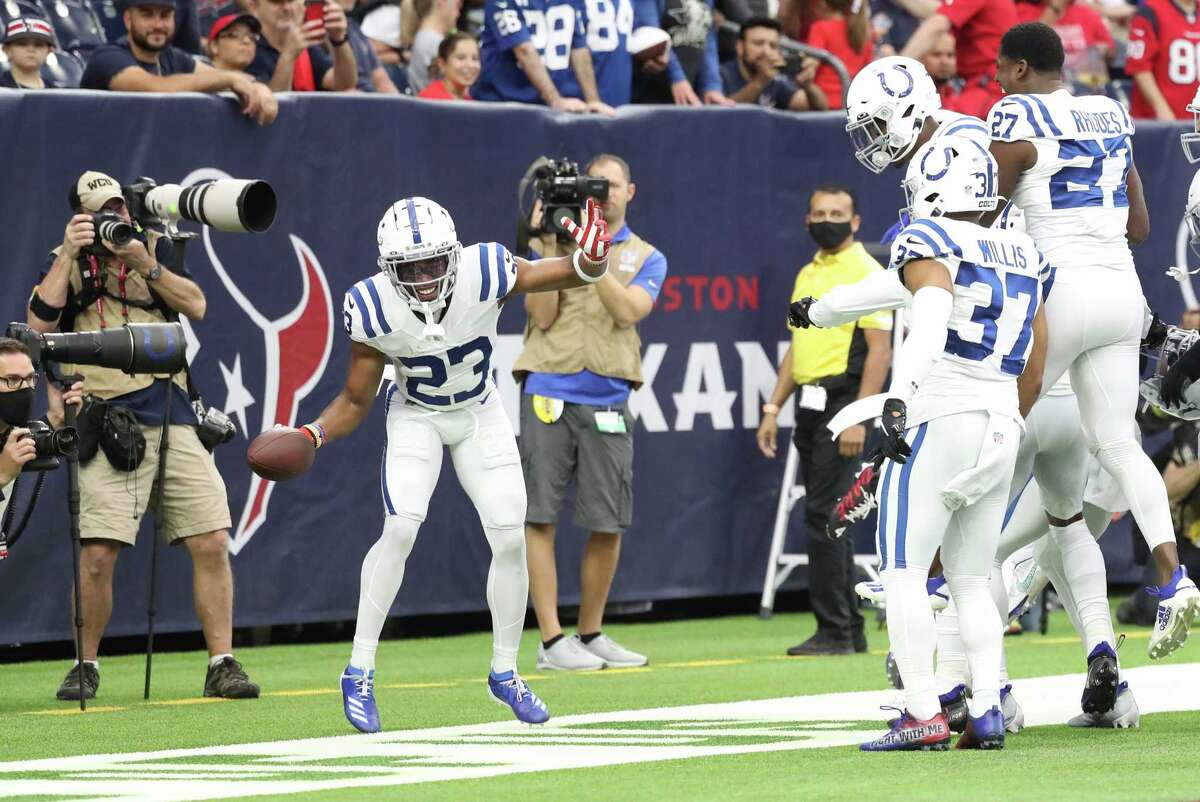 Indianapolis Colts cornerback Kenny Moore II (23) celebrates in the end zone after their turnover during the first half of an NFL football game at NRG Stadium, Sunday, Dec. 5, 2021 in Houston.