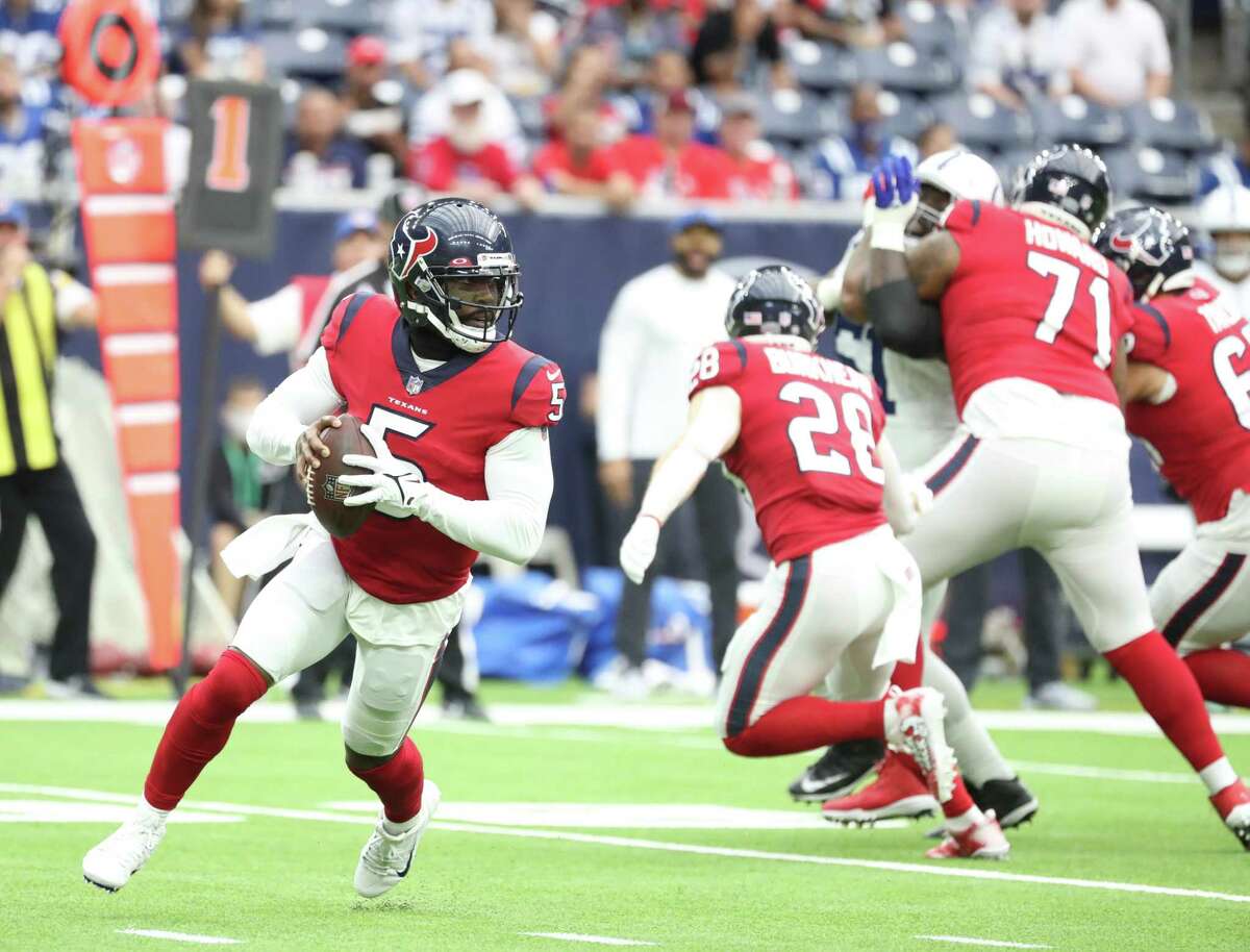 Houston Texans quarterback Tyrod Taylor (5) looks to pass during the first half of an NFL football game at NRG Stadium, Sunday, Dec. 5, 2021 in Houston.