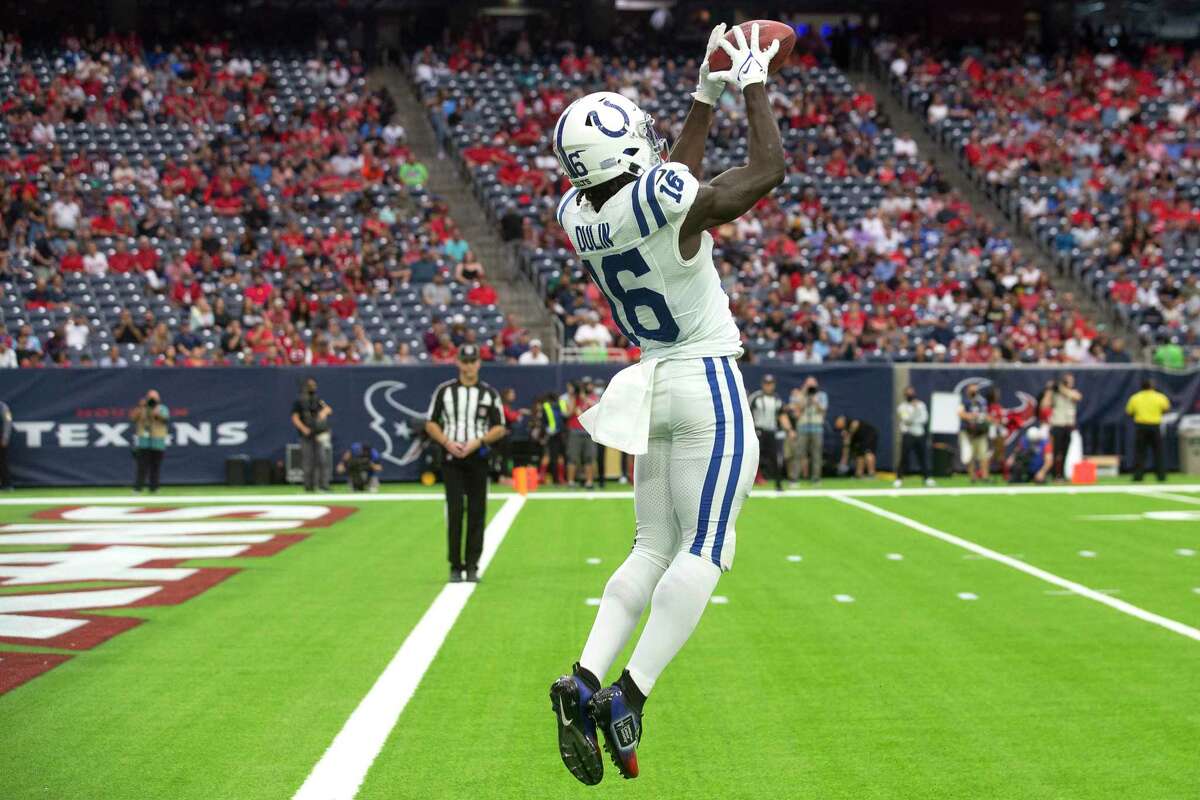 Indianapolis Colts wide receiver Ashton Dulin (16) downs a punt, pinning the Houston Texans inside the 5-yard line, during then first half of an NFL football game Sunday, Dec. 5, 2021 in Houston.