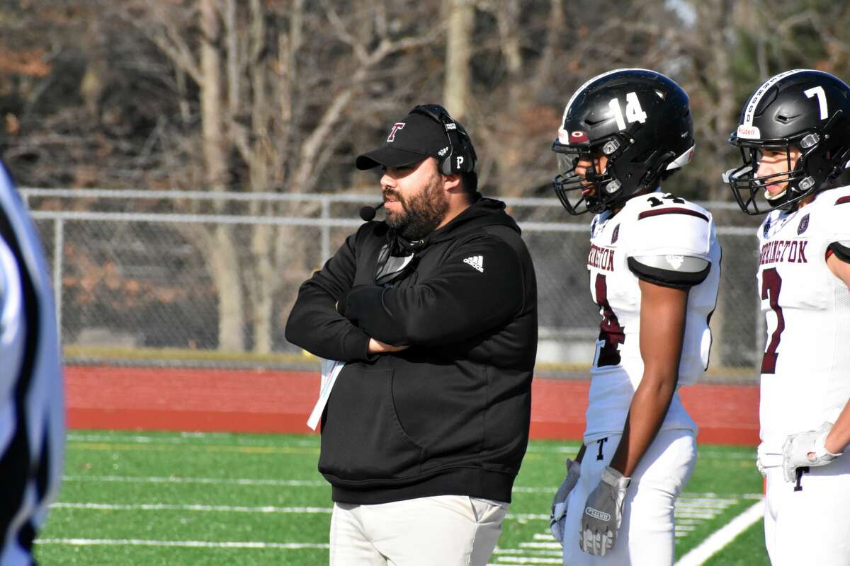 Torrington coach Gaitan Rodriguez on the sidelines during the Class M state semifinal football game at Rockville high school, Vernon on Sunday, Dec. 5, 2021.