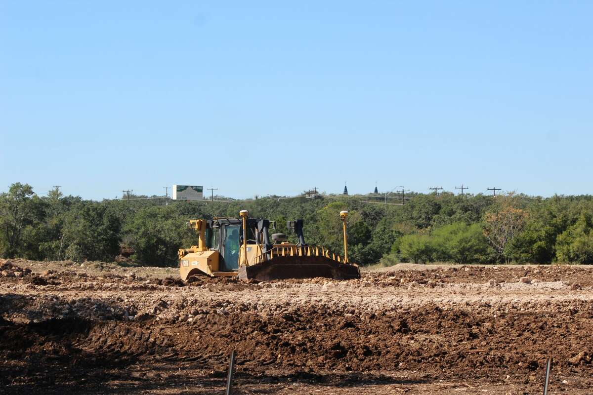 More than 1,000 San Antonio residents have signed a petition against the development of green spaces across the city. A bulldozer is seen performing site work in early November at The Shops at Babcock property located near the intersection of Babcock Road and Loop 1604.