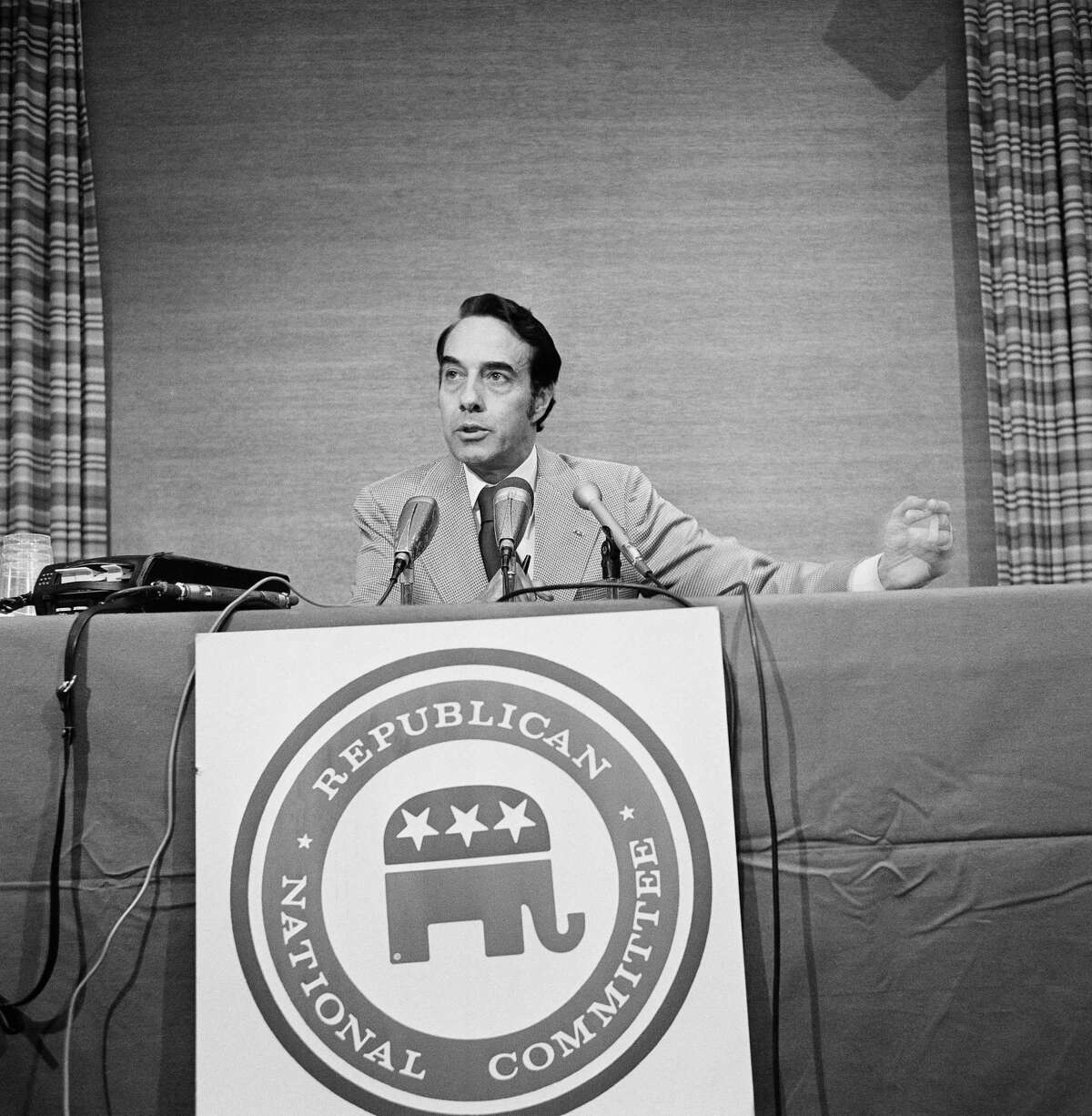 FILE - In this April 22, 1972, file photo Sen. Robert Dole (R-Kan), chairman of the Republican National Committee, speaks in Chicago. Bob Dole, who overcame disabling war wounds to become a sharp-tongued Senate leader from Kansas, a Republican presidential candidate and then a symbol and celebrant of his dwindling generation of World War II veterans, has died. He was 98. His wife, Elizabeth Dole, posted the announcement Sunday, Dec. 5, 2021, on Twitter. (AP Photo/ESK, File)