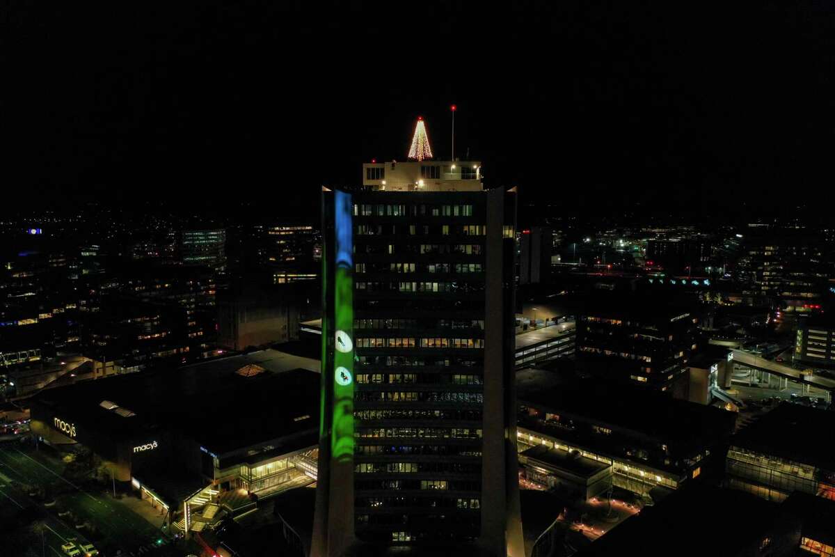 A drone view as Santa and friends took a traditional leap off the tallest building in Stamford Sunday, rappelling down the Landmark Building.