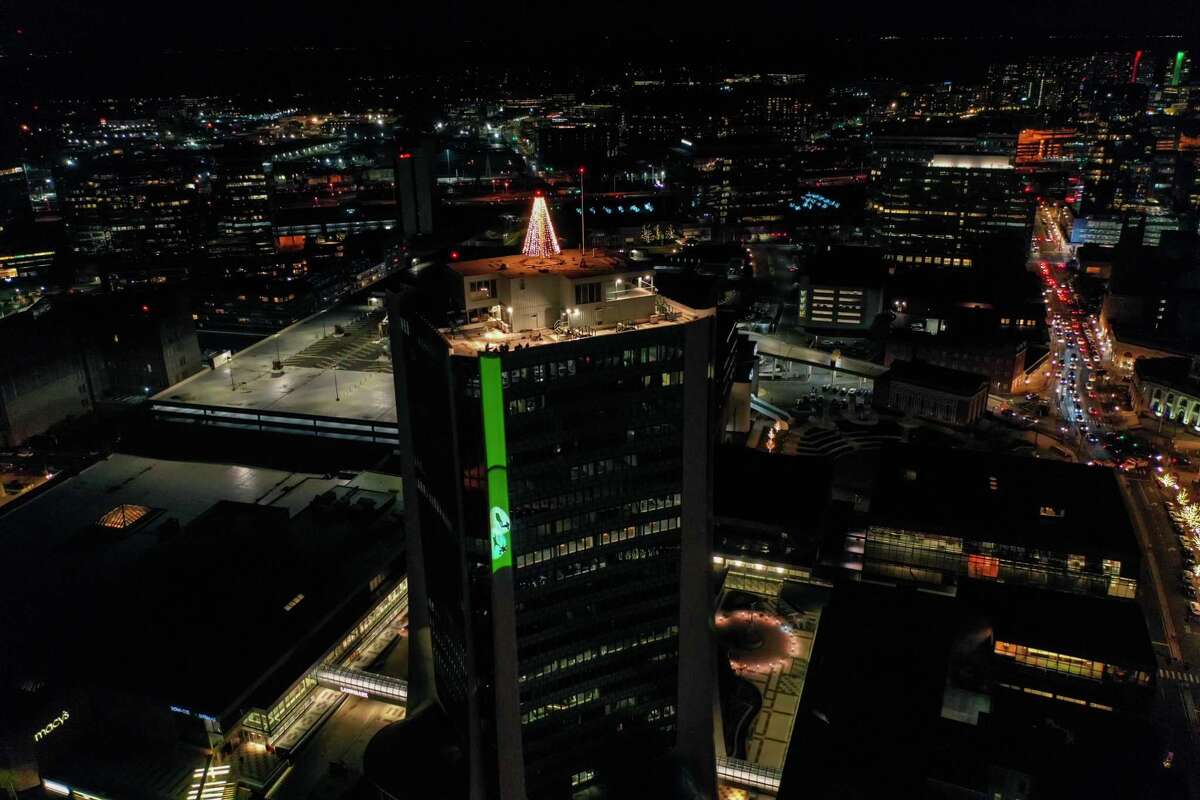 A drone view as Santa and friends took a traditional leap off the tallest building in Stamford Sunday, rappelling down the Landmark Building.