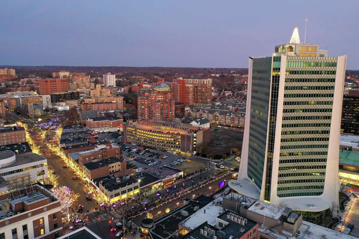 A drone view as Santa and friends took a traditional leap off the tallest building in Stamford Sunday, rappelling down the Landmark Building.
