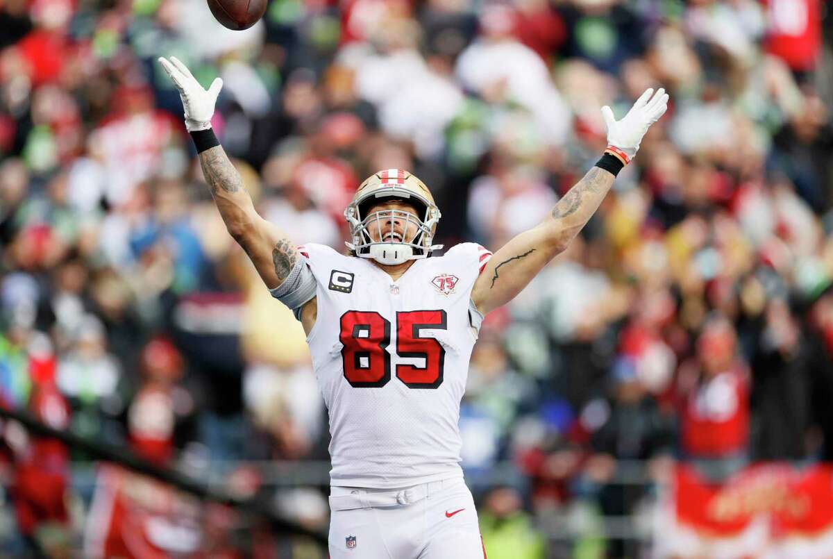 SEATTLE, WASHINGTON - DECEMBER 05: George Kittle #85 of the San Francisco 49ers reacts after scoring a touchdown during the second quarter against the Seattle Seahawks at Lumen Field on December 05, 2021 in Seattle, Washington. (Photo by Steph Chambers/Getty Images)