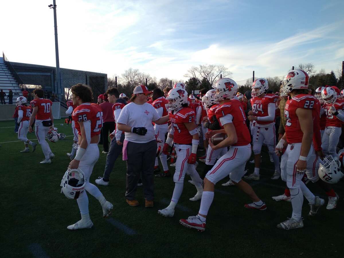 Fairfield Prep's football team after defeating Shelton 24-3 in the Class LL semifinals at Rafferty Stadium, Sunday, Dec. 5, 2021.