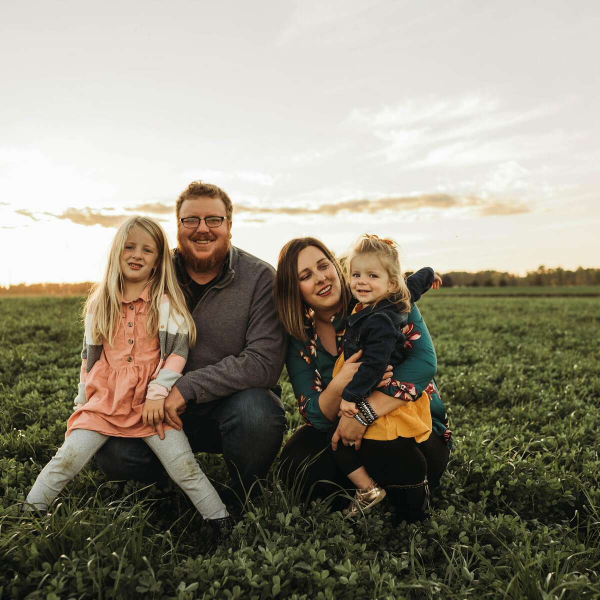 Ashley Kennedy, Young Farmer award winner, and her family.