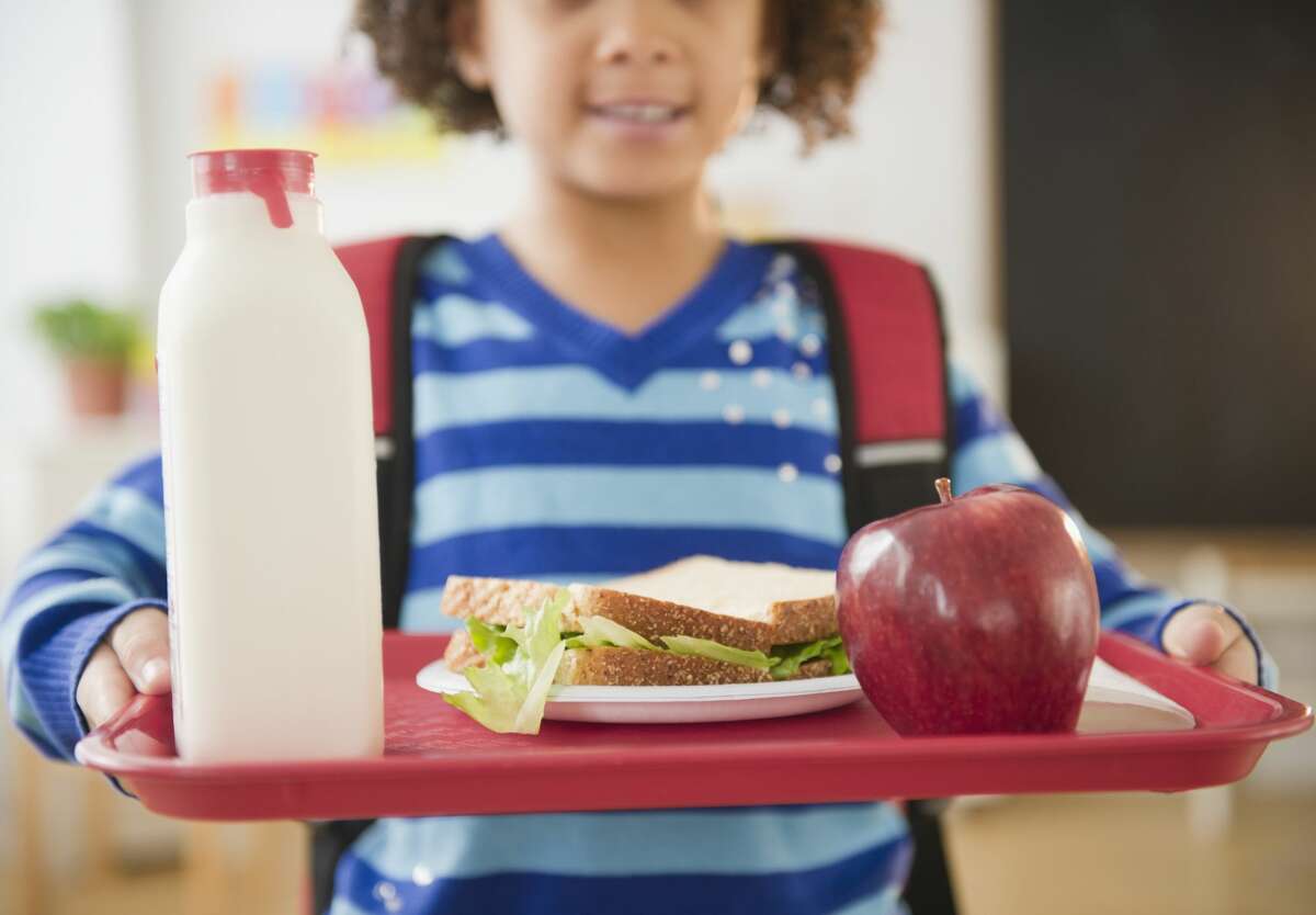 A file image of a child getting lunch at school. 
