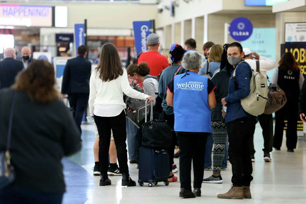 Passengers head to the TSA checkpoint at the San Antonio International Airport A terminal Wednesday, Dec. 1.