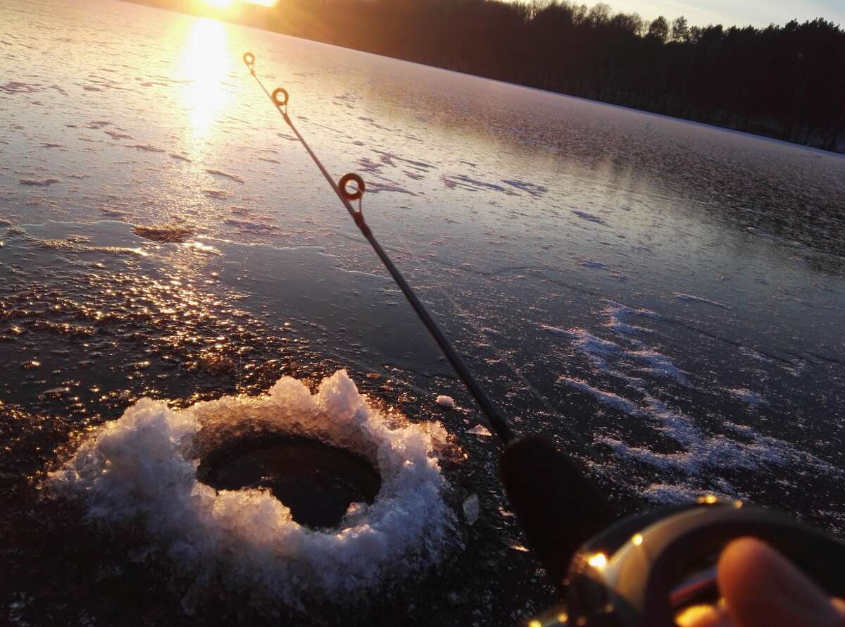 Even winter activity like ice fishing can cause the spread of invasive plants and animals. 