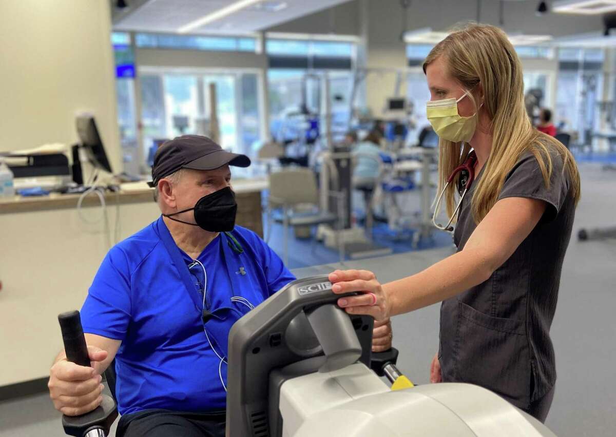 Jack Redfearn, of Magnolia, receives outpatient cardiac rehabilitation from Senior Exercise Physiologist, Kalyn Tipton, as part of comprehensive cardiovascular care offered at Houston Methodist The Woodlands Hospital.
