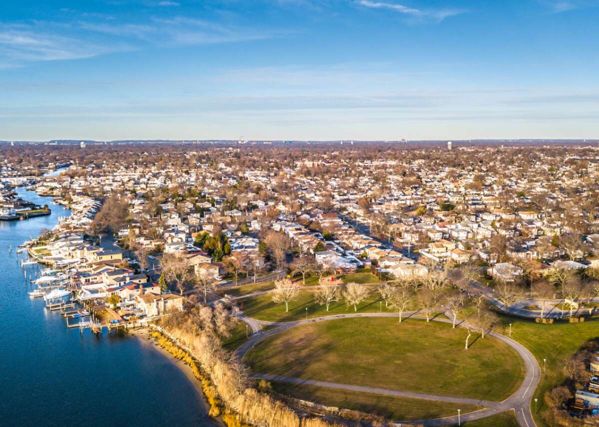 #10. Long Island, New York - Total households in 2021: 962,500 (five-year projected annual change: 0.3%) - 2020 median home price: $460,000 (14.1% more than 2019) - Housing Opportunity Index: 53.5 out of 100 - Walk score: 95 out of 100 - Rent as percent of household income: 23.2% - 2021 total employment: 1,230,000 (five-year projected annual change: 2.6%) - Real GDP per capita: $59,812 (five-year projected annual change: 2.1%) Long Island, New York, has become a hot housing market over the last few years—and there are a few factors making this city one to watch for real estate investors. For starters, Long Island is home to some of the best schools in the state of New York, making it a desirable location for families who want to live in neighborhoods with access to excellent education options. Plus, tons of former New York City residents have flocked to Long Island recently to buy homes with more room than cramped city apartments could offer, which has made this market even hotter at a time when real estate across the nation is at a premium. The city’s relatively close proximity to New York City— which is just a train ride away—makes it a viable option for commuters, and Long Island’s rising but still affordable housing prices also make it an excellent choice for buyers who want to escape the extremely high costs of buying in the city. This island also offers buyers access to homes in neighborhoods of all types and price points, from affordable neighborhoods to the exclusive, costly Hamptons. Add in the city’s excellent walkability scores, access to entertainment and...