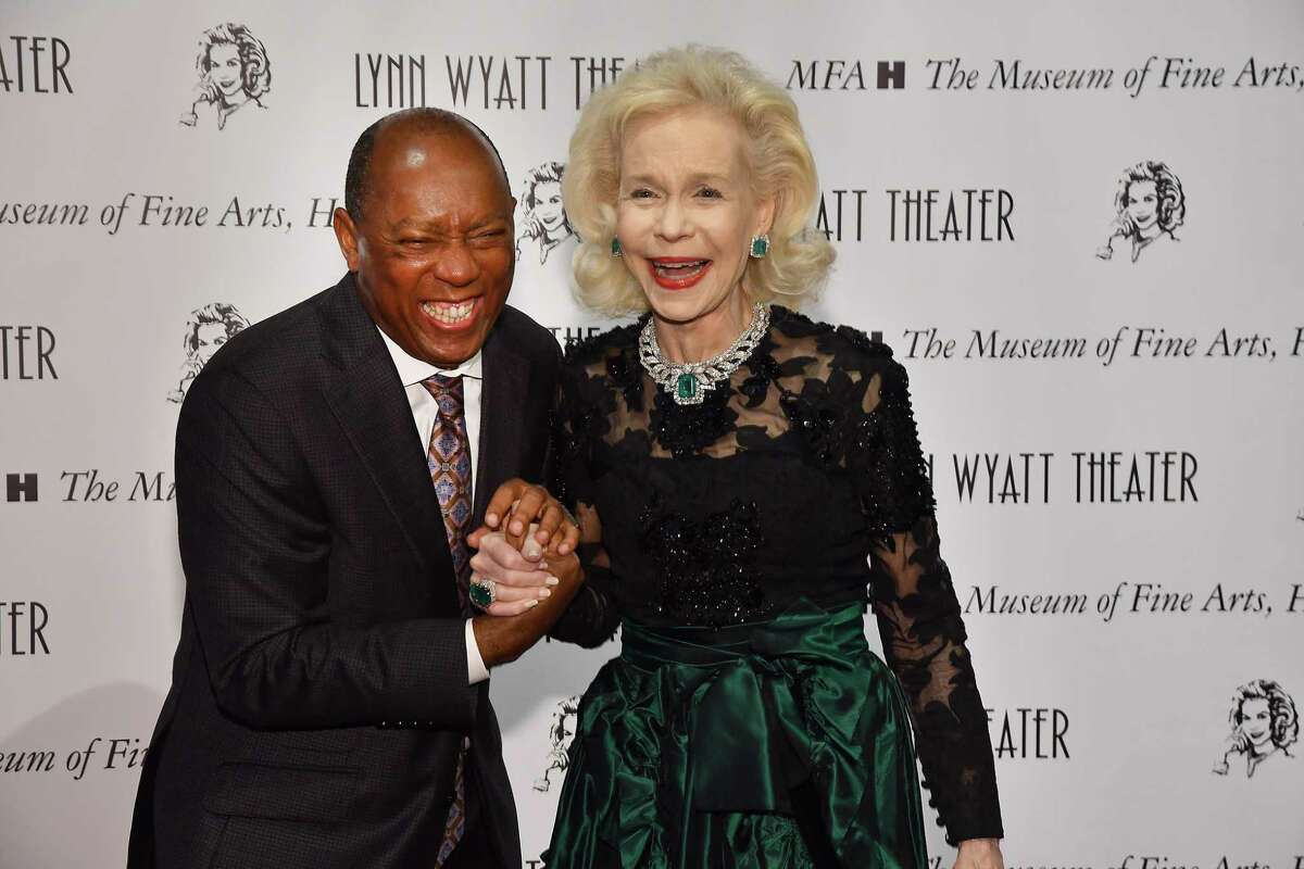 Mayor Sylvester Turner shares a laugh with Lynn Wyatt at the opening of the Lynn Wyatt Theater in the Kinder Building at the Museum of Fine Arts Houston Friday Dec. 03,2021.