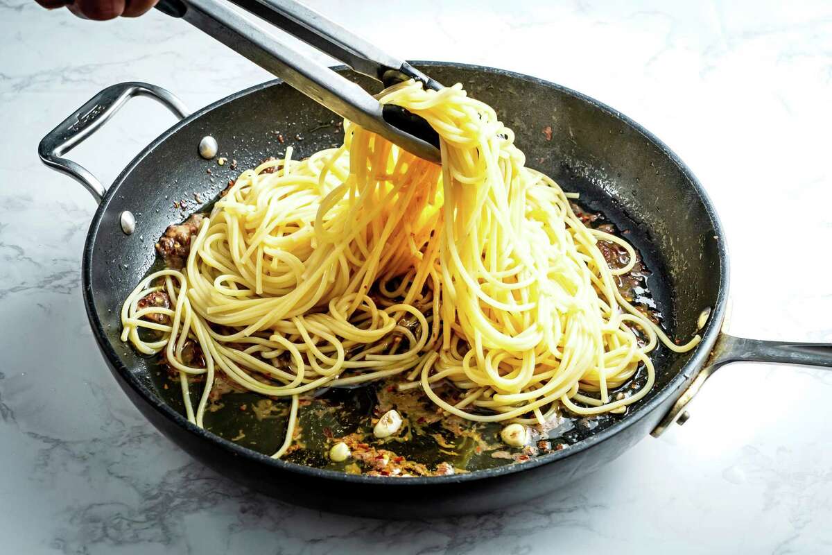 Spaghetti With Anchovy, Lemon and Arugula.