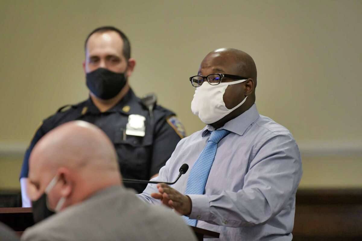 Defendant James White gives his closing argument in his quadruple-murder trial on Monday, Dec. 6, 2021, in Troy, N.Y.