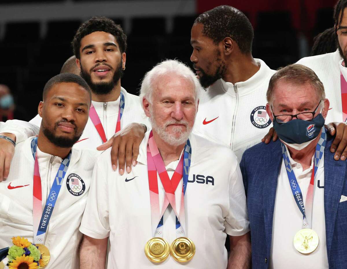 Team USA coach Gregg Popovich poses with, from left, Damian Lillard, Jayson Tatum, Kevin Durant and Jerry Colangelo during the medal ceremony at the Tokyo 2020 Olympic Games at Saitama Super Arena on Aug. 7, 2021 in Saitama, Japan.