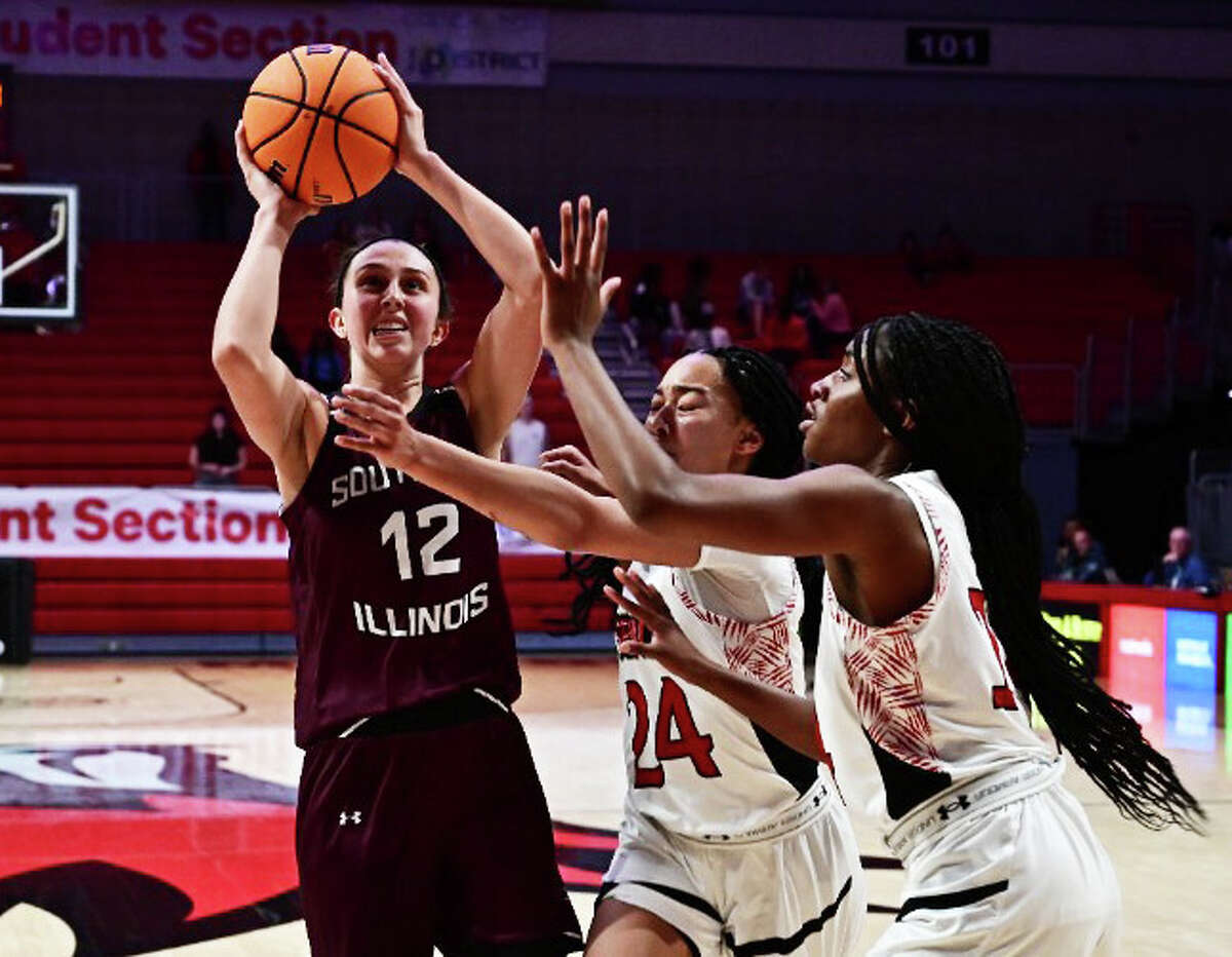 SIUC's Makenzie Silvey puts up a shot in the lane in traffic during a game earlier this season.