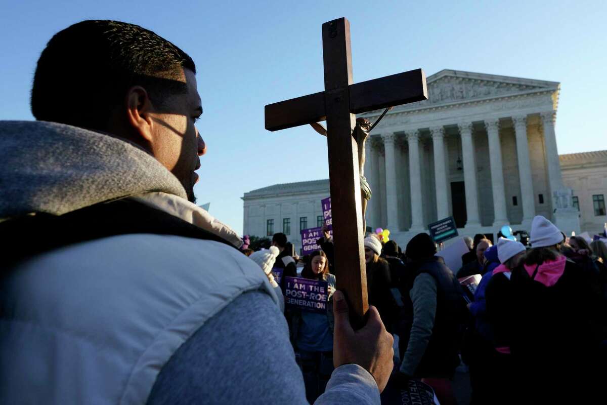 Pro-life and pro-abortion rights protesters rally outside as the U.S. Supreme Court hears arguments in "Dobbs v. Jackson Women's Health Organization" in Washington, D.C. on Wednesday, Dec. 1, 2021. (Yuri Gripas/Abaca Press/TNS)