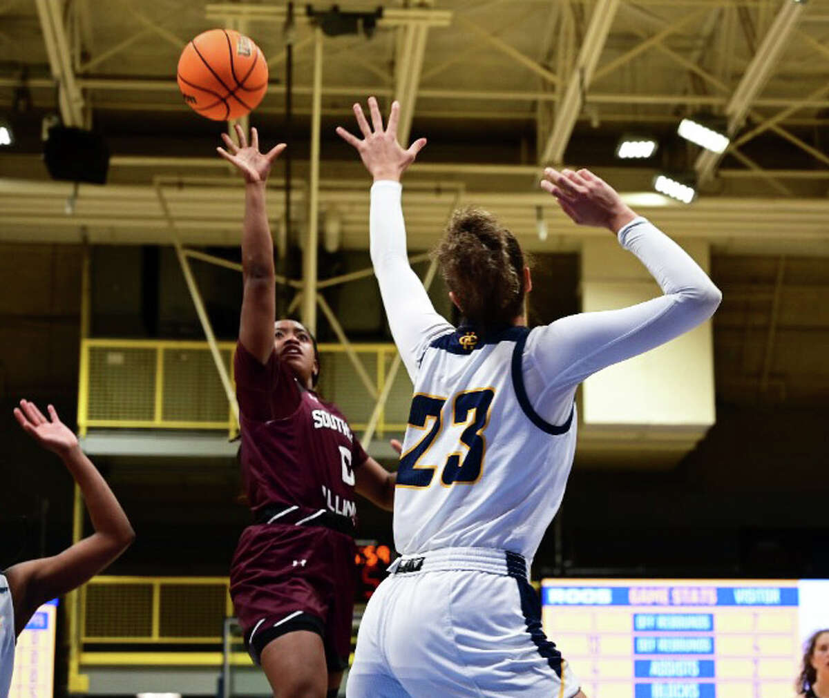 SIU's Quierra Love puts up a runner in the lane during a game earlier this season.