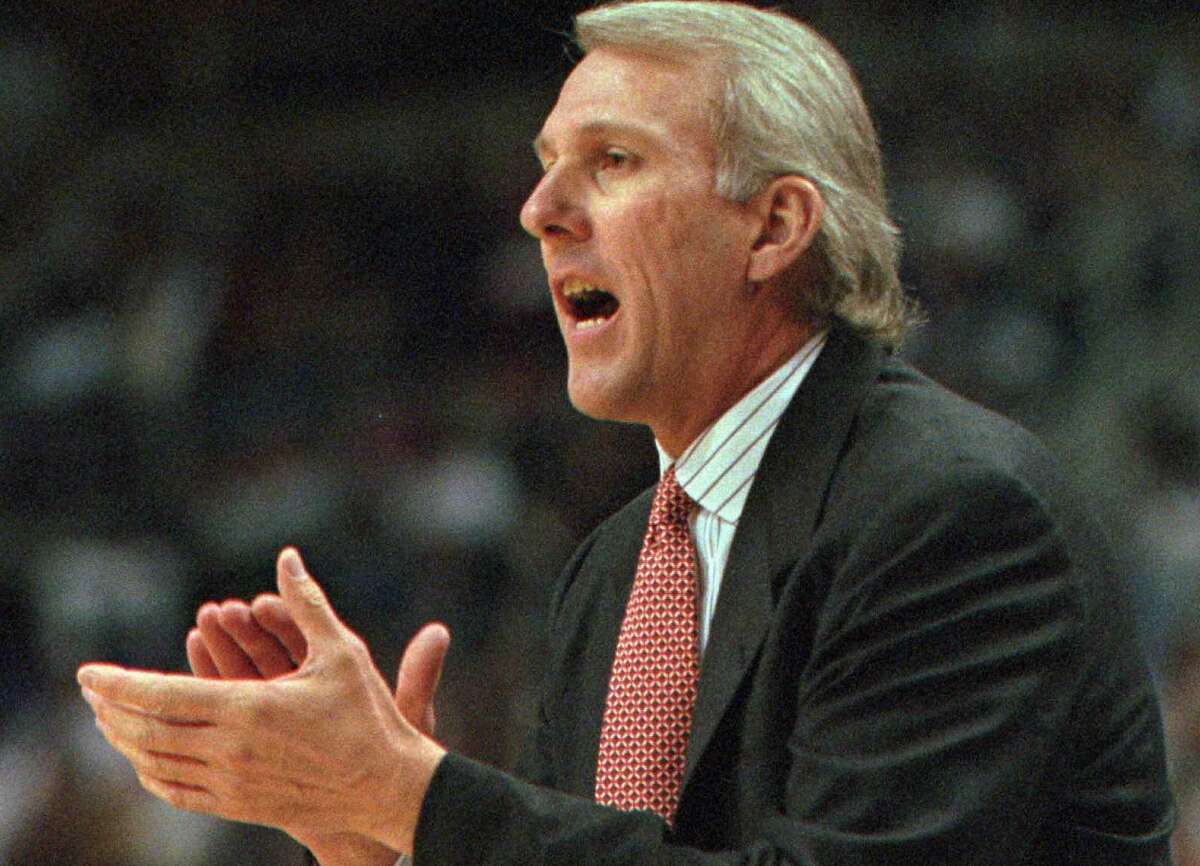 San Antonio Spurs new head coach Gregg Popovich encourages his team during his first game as coach against the Phoenix Suns in 1996. Popovich replaced former Spurs head coach Bob Hill who coached the team to a 3-15 start.