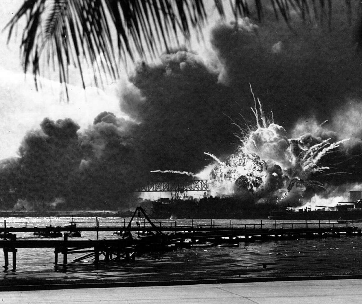 The USS Shaw explodes during the Japanese raid on Pearl Harbor, Dec. 7, 1941.