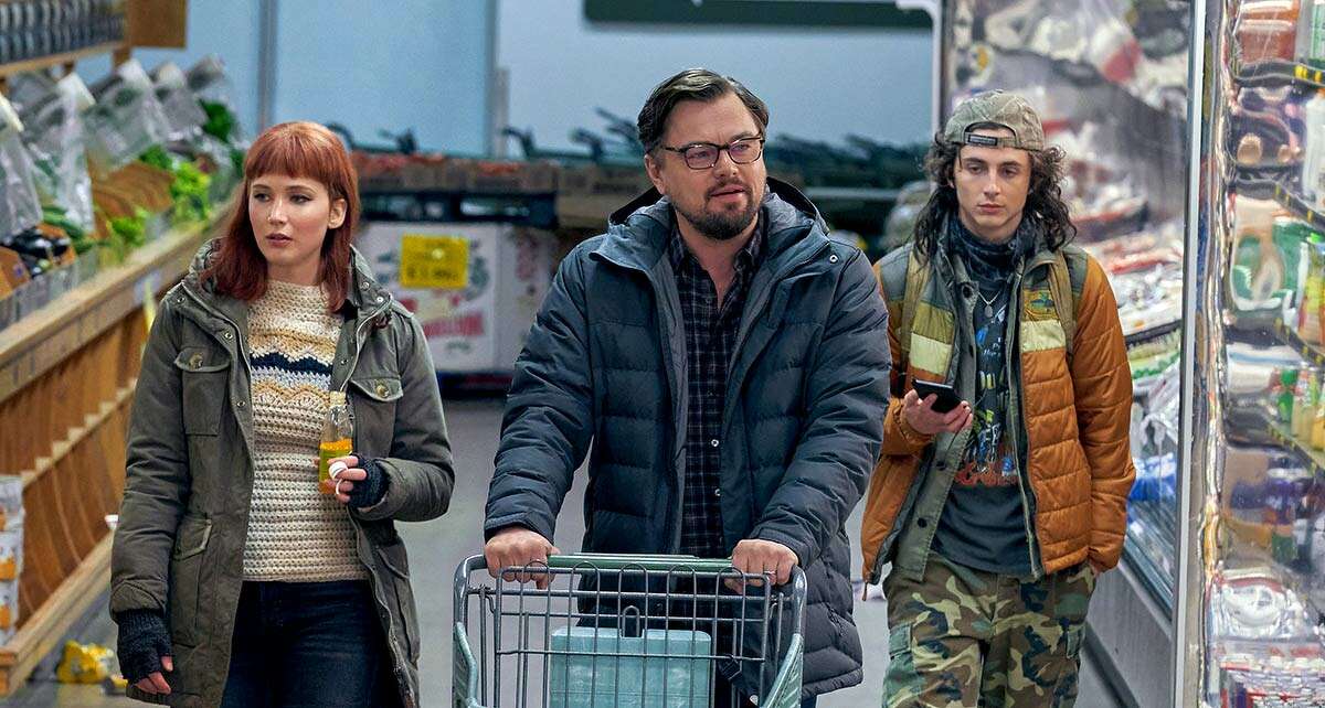 From left, Jennifer Lawrence, Leonardo DiCaprio and Timothée Chalamet go shopping for the end of the world in "Don't Look Up," the latest satire from Adam McKay ("The Big Short," "Vice"). 