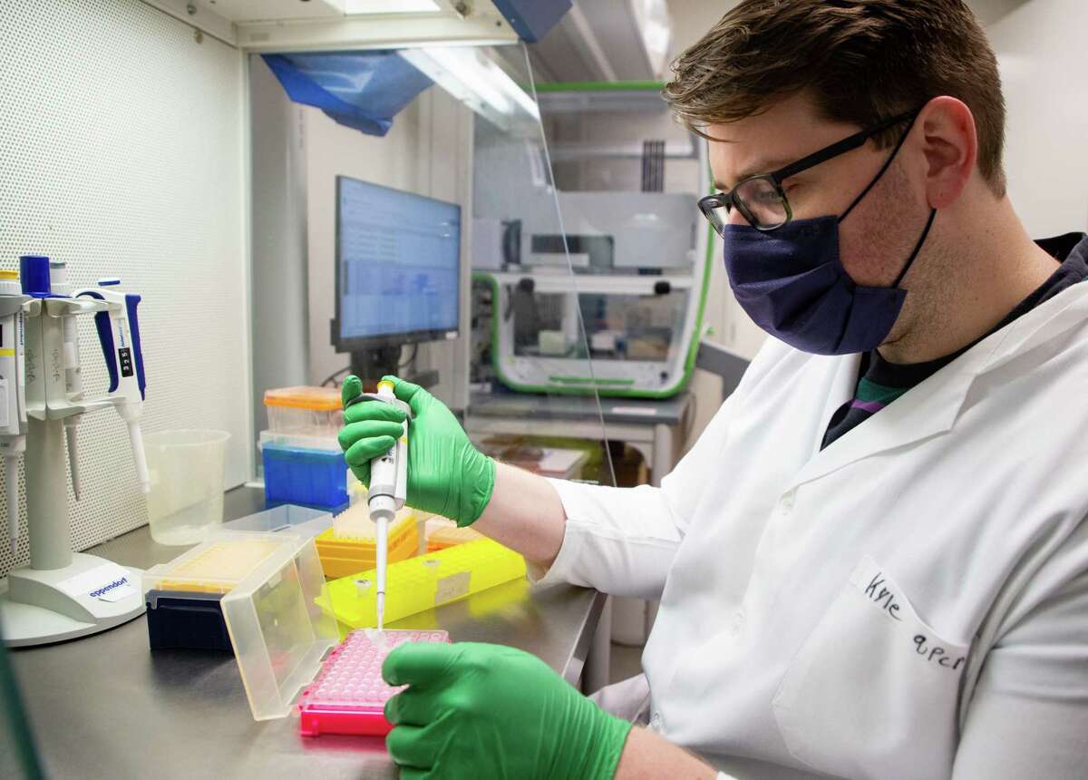Research technician Kyle Palmer works to add reagents to the RNA that has been extracted from the waste water, the reagent helps qualify the variant and amount of COVID-19, inside the Stadler lab at Rice University’s Brown School of Engineering on Friday, April 9, 2021, in Houston. Rice University, Baylor College of Medicine and Houston Health Department have created a 200-location system to find sars-COV-2 in the city’s wastewater. By analyzing sewage, the scientists and city are able to see which neighborhoods are still affected by the virus, where the UK variant is most prevalent and if Houston is developing its own variant.