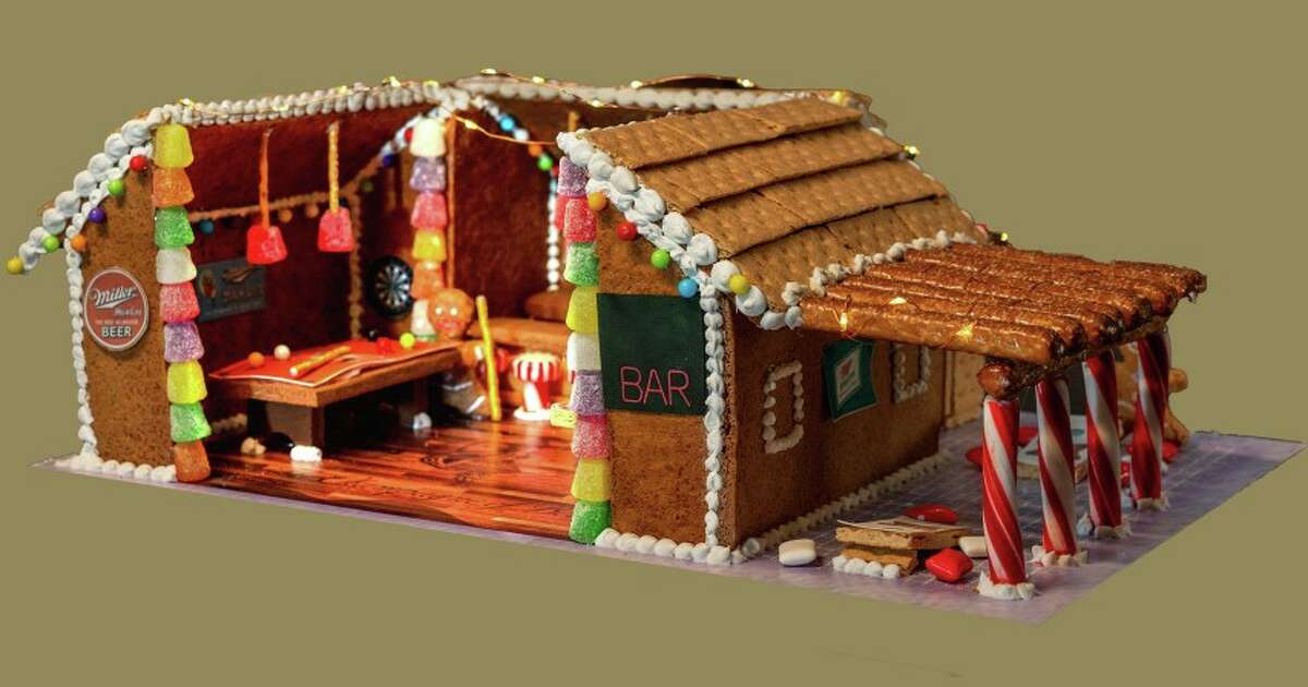The gingerbread watering hole is festooned with peppermint bar stools, gumdrop decor, pretzel stick pool cues and more.