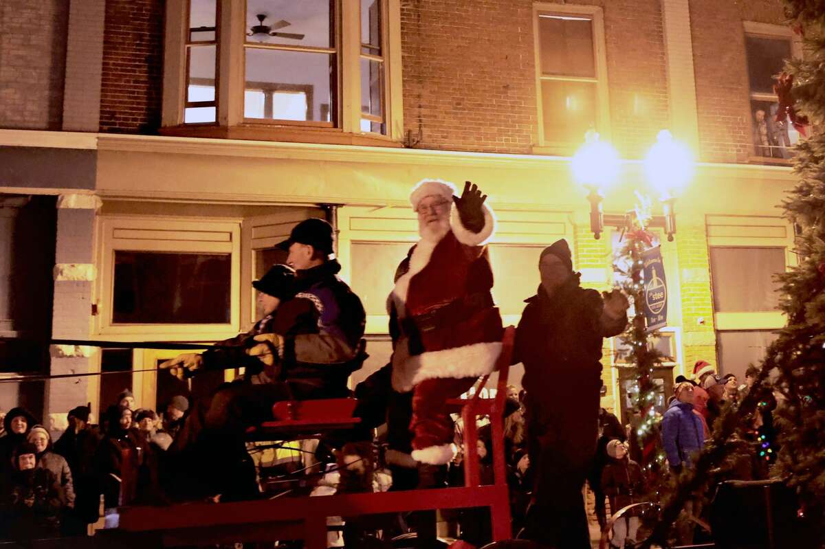 A man dressed as Santa waves to the crowd at the Victorian Sleighbell parade on River Street on Saturday. The parade returned after a year off, due to the ongoing COVID-19 pandemic.