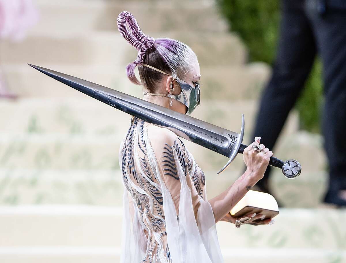 Singer Grimes attends The 2021 Met Gala Celebrating In America: A Lexicon Of Fashion at The Metropolitan Museum of Art on September 13, 2021 in New York City.