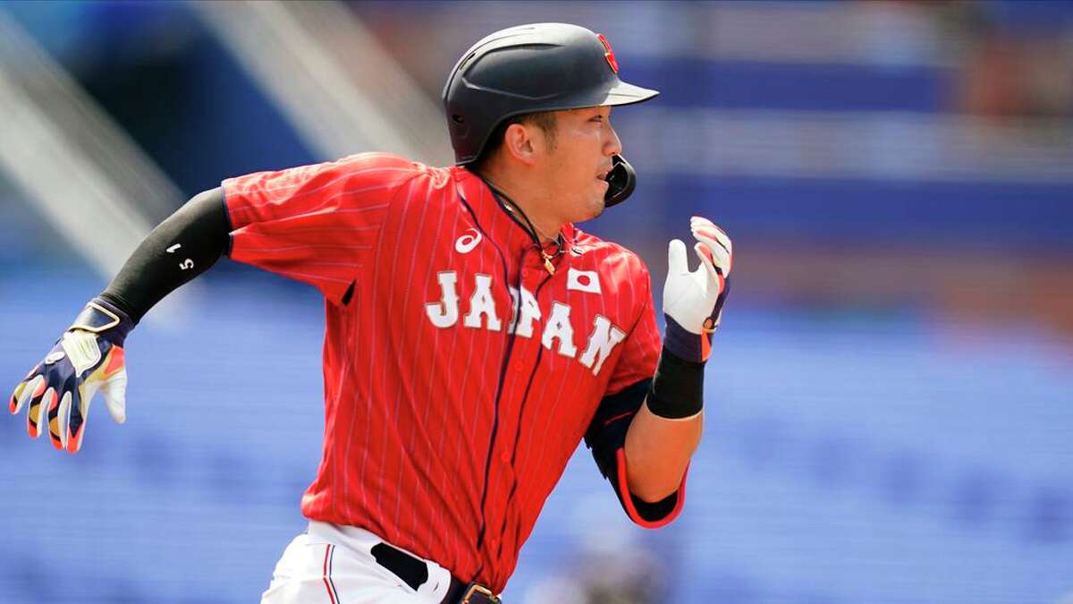 FILE - Japan's Seiya Suzuki plays during a baseball game at Yokohama Baseball Stadium during the 2020 Summer Olympics, Saturday, July 31, 2021, in Yokohama, Japan. Japanese outfielder Suzuki will be posted on Monday, Nov. 22, 2021, by his Japanese club and will be available for bidding by the 30 Major League Baseball teams. (AP Photo/Matt Slocum, File)