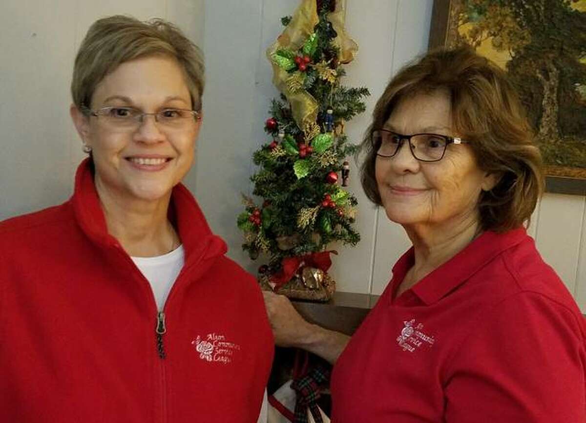 In December 2020, Alton Community Service League (ACSL) members Cathy Droste and her mother, Sandy Goeken, wear new ACSL apparel. Due to COVID-19, the nonprofit group did not gift wrap at Alton Square Mall, but the ACSL’s biggest fundraiser of the year is back this year starting Thursday, Dec. 11, daily from noon-6 p.m., until Wednesday, Dec. 22 and Thursday, Dec. 23, with hours from noon-7 p.m. and Friday, Dec. 24, from noon-6 p.m. 