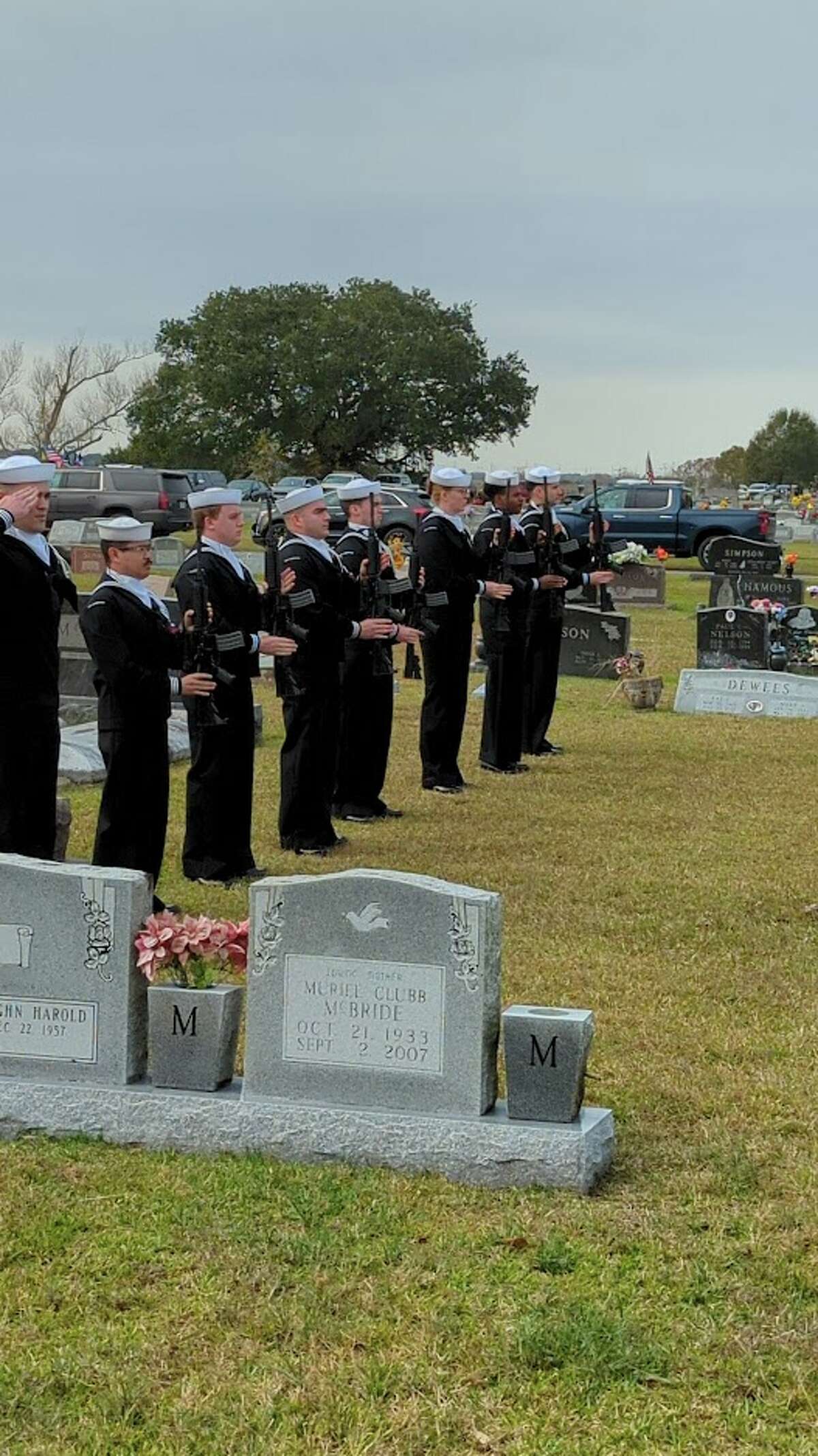 Navy Honor Guard presents arms at Charles L. Saunders funeral. 