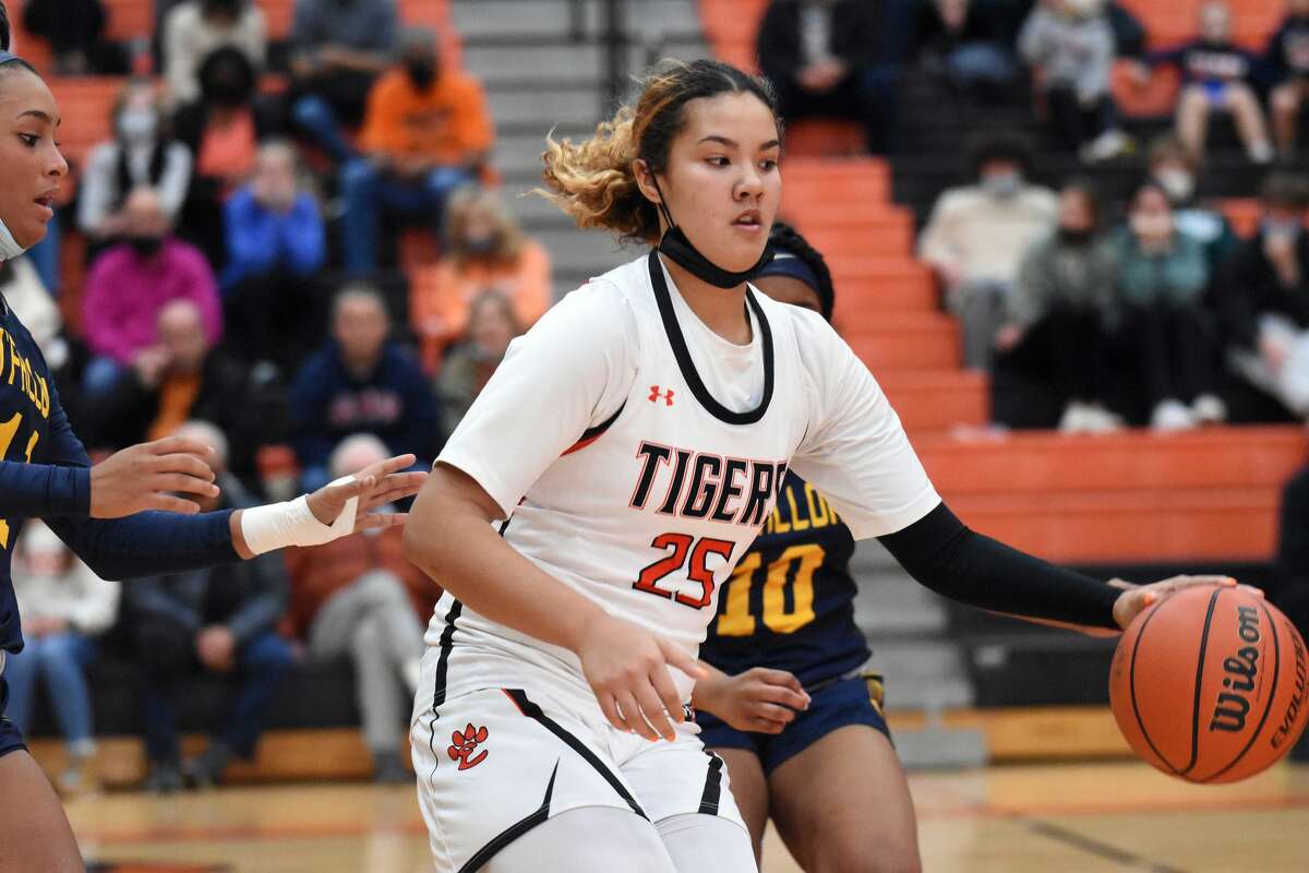 Edwardsville's Sydney Harris avoids a double team during the second half of Tuesday's game inside Lucco-Jackson Gymnasium in Edwardsville.