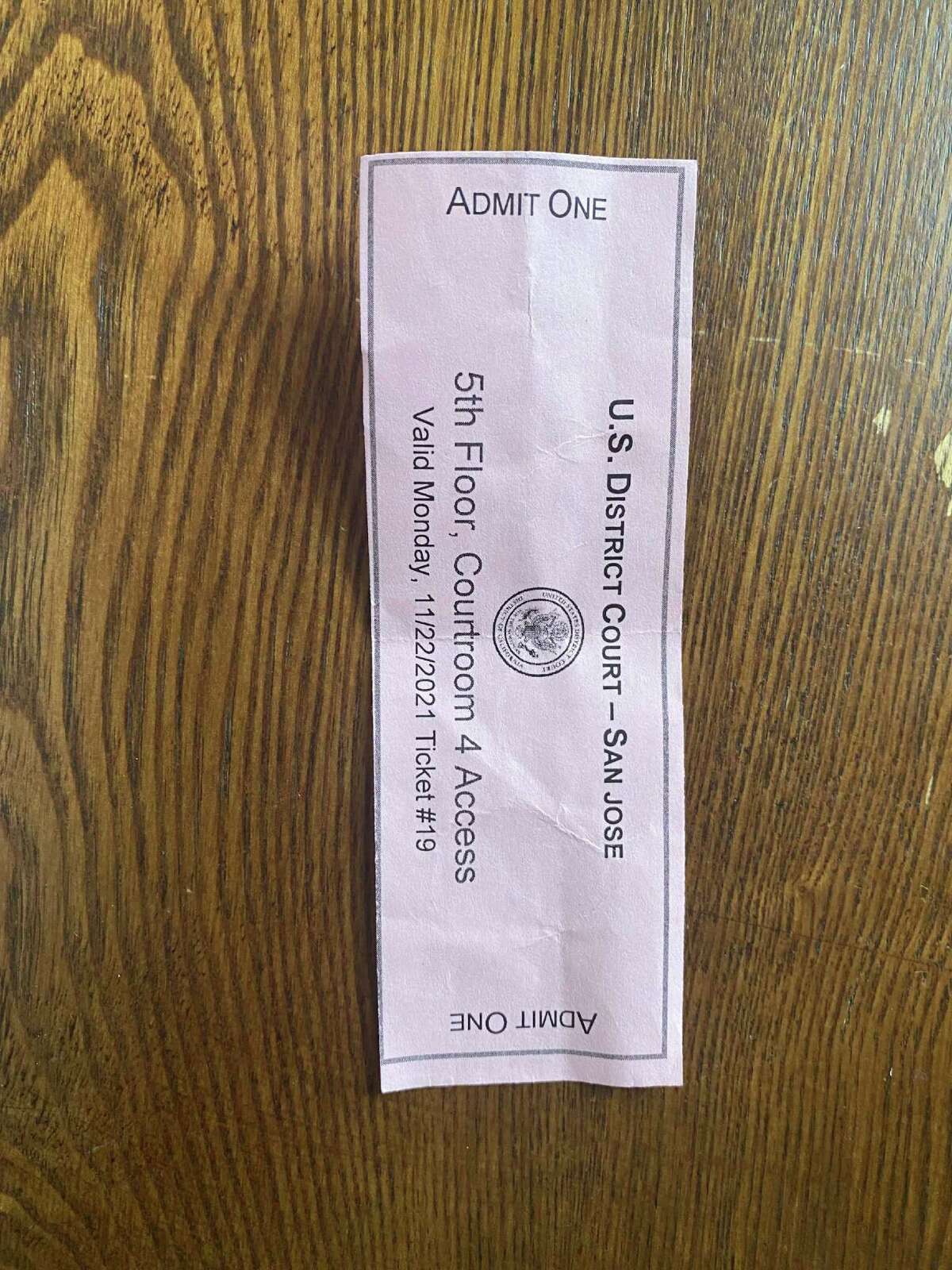 One of the tickets given to attendees of the Elizabeth Holmes trial is seen in San Francisco on December 6, 2021.