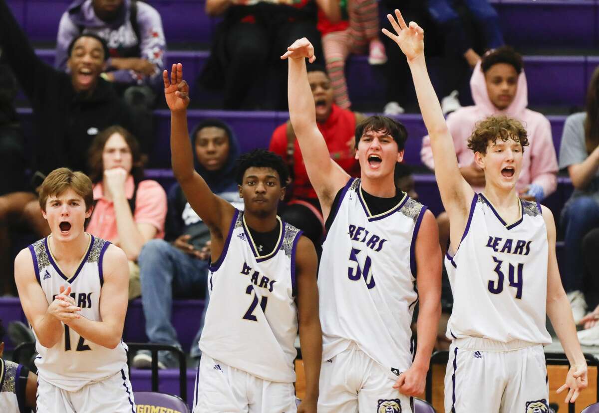 Montgomery players react after a three-pointer during the fourth quarter of a non-district high school basketball game at Montgomery High School, Tuesday, Dec. 7, 2021, in Montgomery.