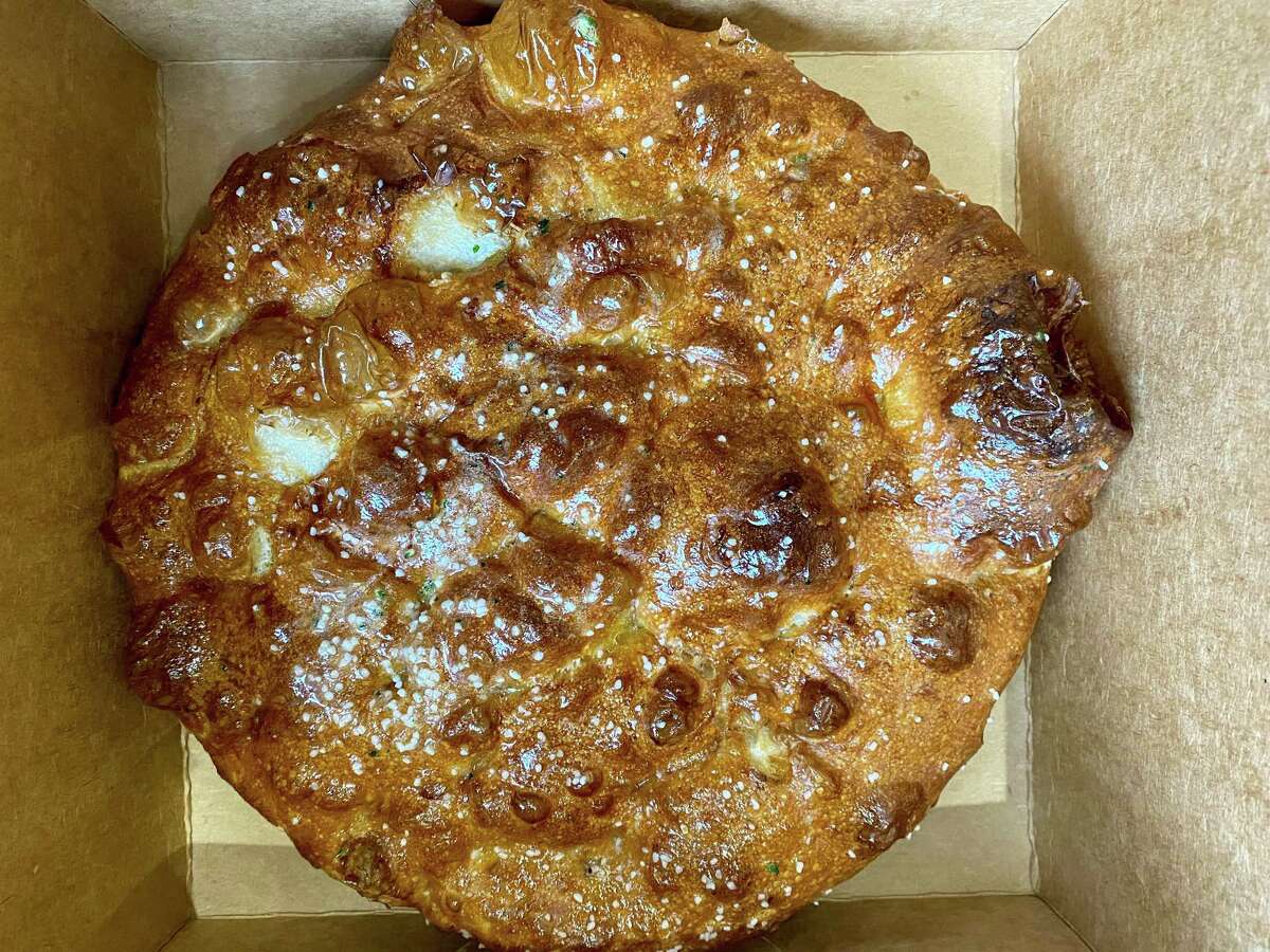 This garlic pretzel focaccia is one of the many fresh bread options at Automat.