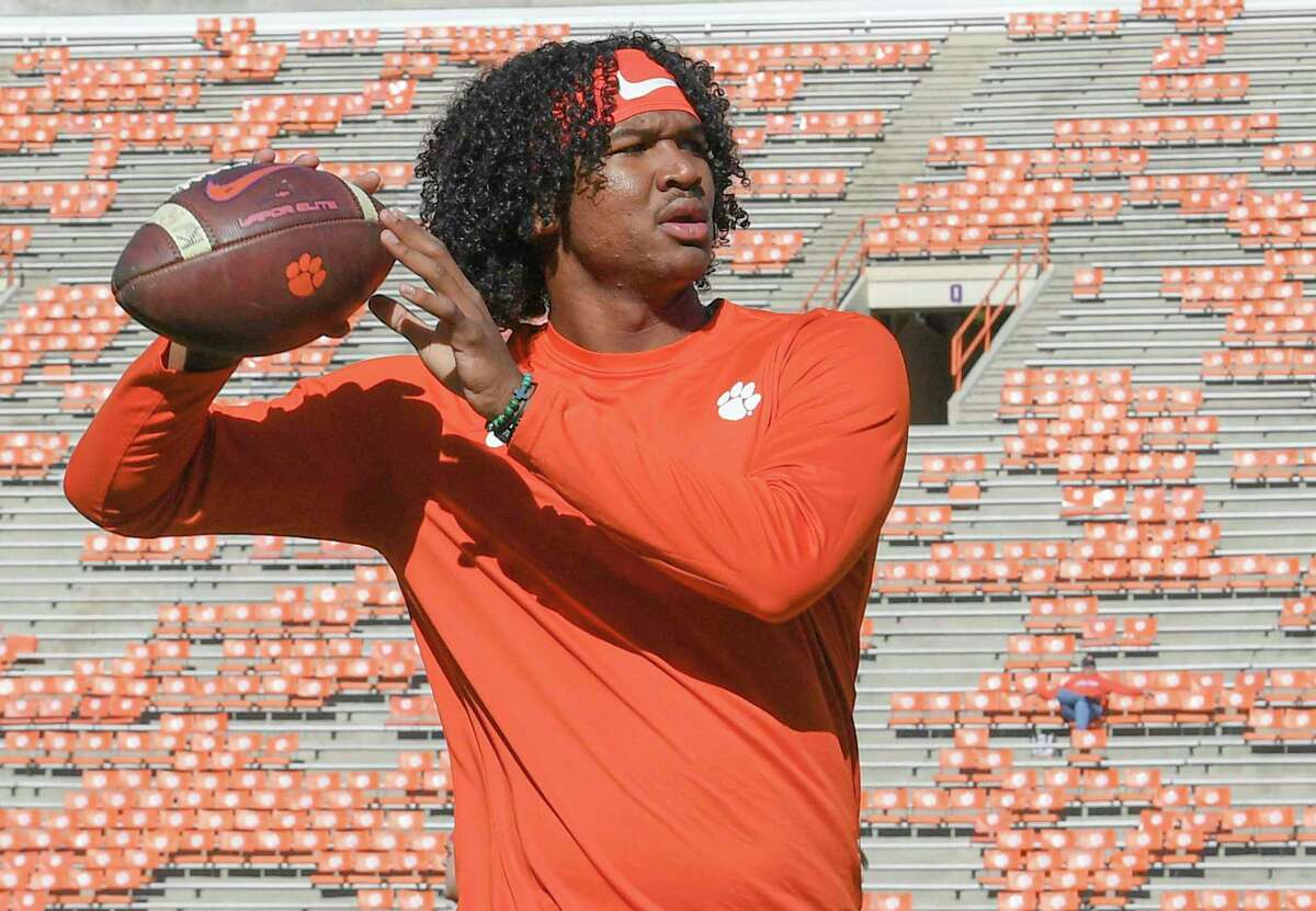 Clemson quarterback Taisun Phommachanh (7) throws as players warm up before an NCAA college football game with Wake Forest at Memorial Stadium in Clemson, S.C. Saturday, Nov. 20, 2021. (Ken Ruinard /The Independent-Mail via AP)