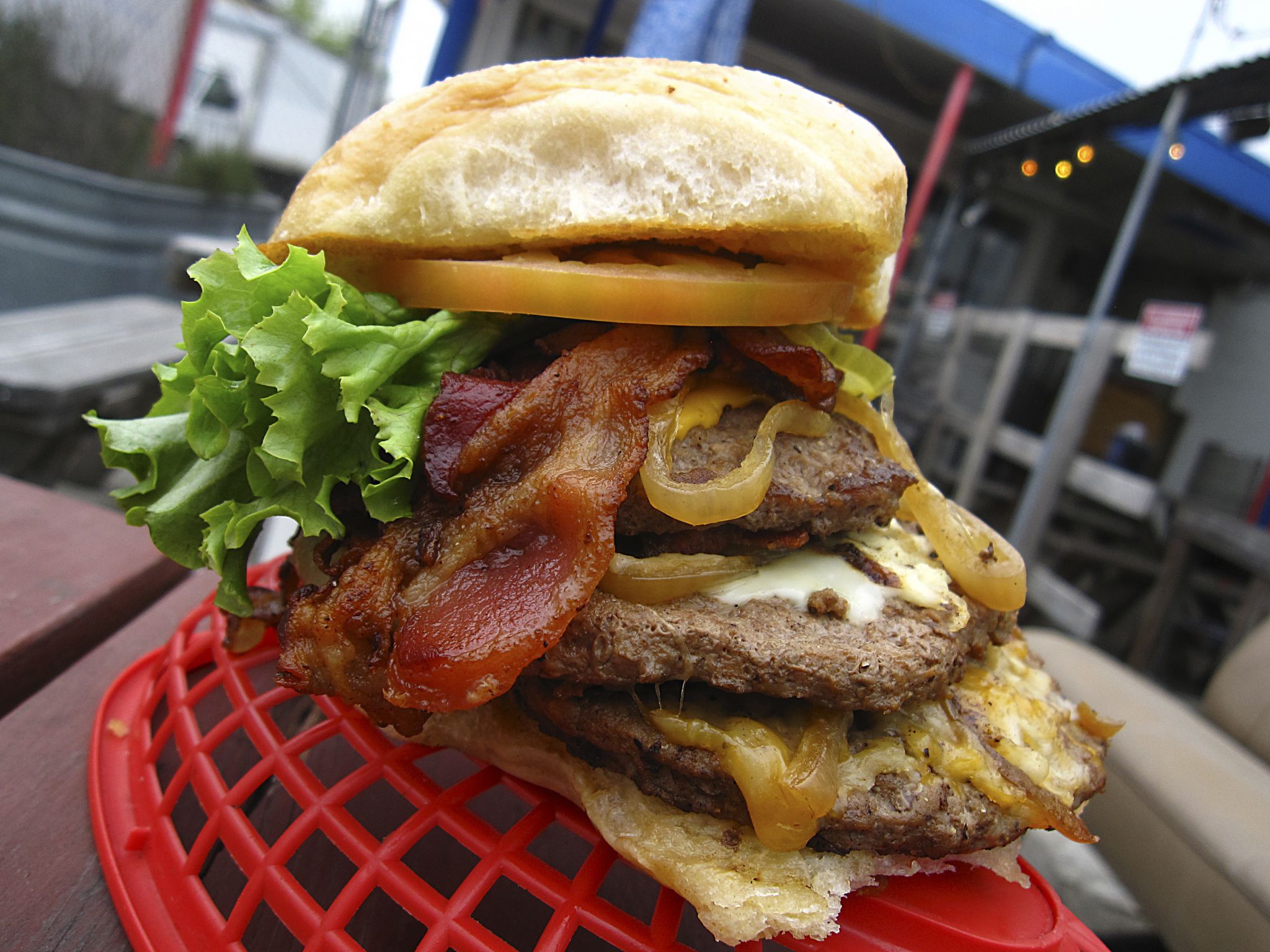 A Texas chain is demanding San Antonio's Papa's Burgers change its