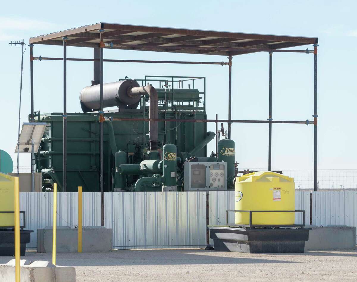 A compressor unit at an Ovintiv tank battery is shown in this December 2021 file photo. The American Gas Association sees a number of opportunities for natural gas producers and providers to accelerate investments in infrastructure and research and development of environmentally-friendly technology like carbon capture and storage and hydrogen.