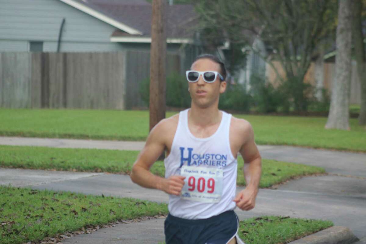 Stephen Wolff heads toward the finish line as champion of the Friendswood Flapjack 5K race Saturday morning. He finished in 18:14.