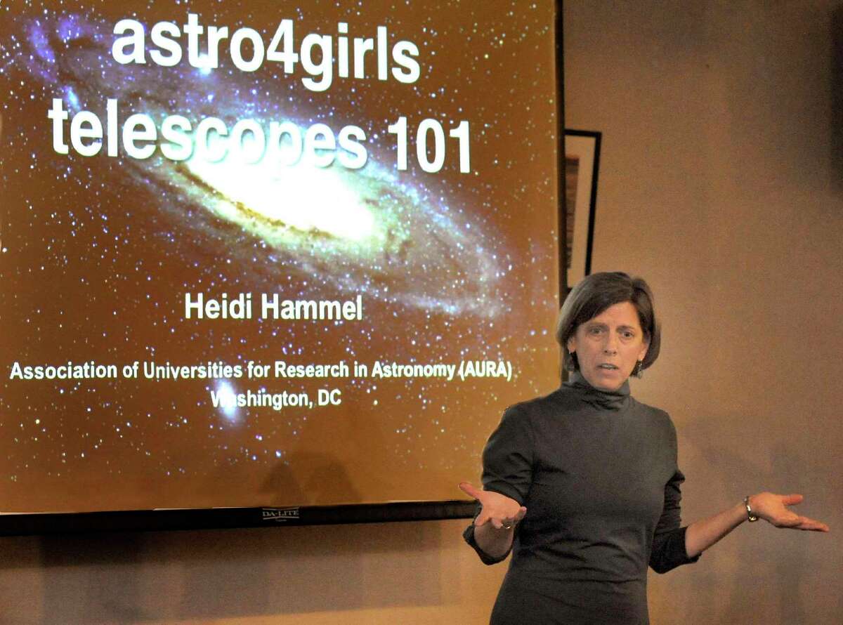 Planatary astronomer Heidi Hammel talks about telescopes during a program at the Ridgefield Library Saturday, March 3, 2012.